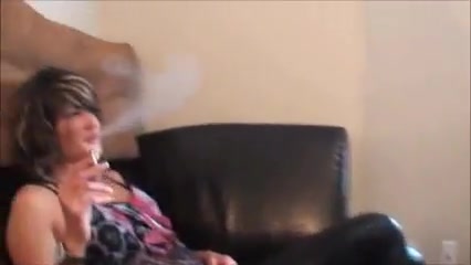 Ballbusting smoking model kicks male femdom slave