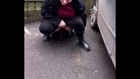 Public pee in a car park