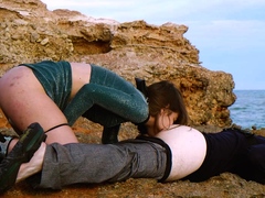 Submissive foot licking and ass eating by the sea