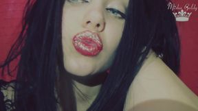 Red lips with golden glitter