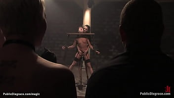 European babe gets her pussy pounded in public while suspended