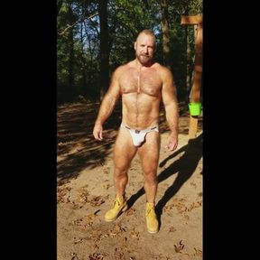 Posing for photographer in jock at campground