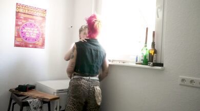 Horny tattooed dykes kiss and finger in kitchen quickie