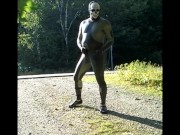 skeleton masked wetsuit on the road