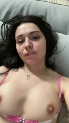 Tease in a tiny dress plays with her big tits