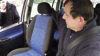 Horny taxi driver is fucking a juicy girl on the backseat