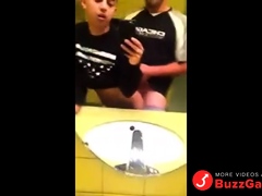 Two twinks fucking in public toilet after practice