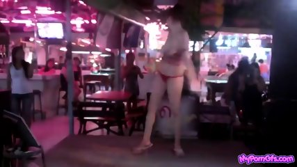 Russian girl striptease in Thai bar outdoor