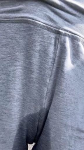 she couldn’t hold it and pees through her leggings in public