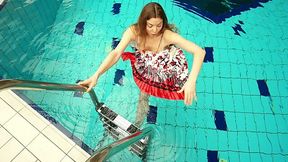 Sizzling hottie Marketa takes off her dress under the water
