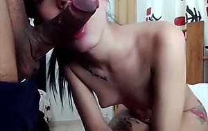 Proper oral by an inked teen tranny