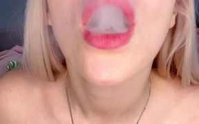 Smoking with a glass dildo in pussy
