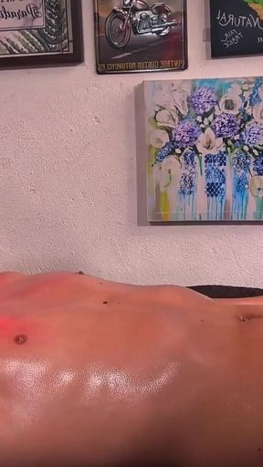 Stunning moment from "Camilo Brown Giving Intense Oil Handjob to Hot Sensitive Twink Jacobo Torres with Some Post Cum Play"