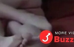 Grandfather and younger play on bed