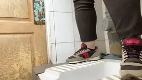 Mature MILF pees in public hospital toilet