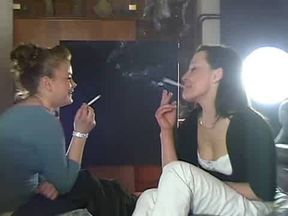 Two friends smoking while having fun
