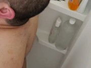 Pounding tub wall until asshole swallows huge butt plug