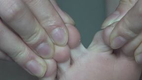 Between young Mei Mei's toes