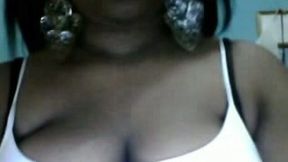 Hot and sexy bronze skin babe on webcam can't hold her tits in the T-shirt