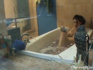 Cute brunette hair watches her stepsister take a washroom