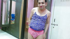 Cute sissy crossdresser femboy Sweet Lollipop in a tank top, pantie and flip-flops with lipstick.