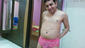 Cute sissy crossdresser femboy Sweet Lollipop in a tank top, pantie and flip-flops with lipstick.