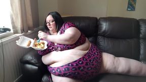 SSBBW stuffing her face in bikini