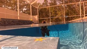 Carissa in the new black free dive fins and black neoprene suit