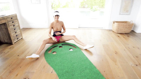 Aila Donovan is playing with mini-golf instructor's pole