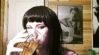 Sissy Drinks her Piss on Cam