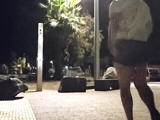 Taking a shower in see-through underwear on the boardwalk at night