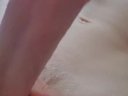 Teen playing with his big dick while bathing