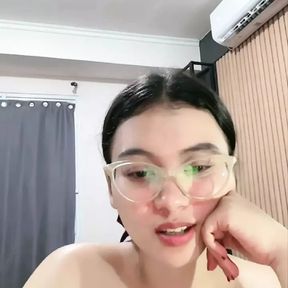 Sexy stylish glasses chick on camera