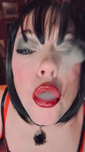 Jaw-dropping moment from "Smoking Mistress Tina Snua Chain Smokes 2 Superking cigarettes In Fishnet Gloves - Smoker smoke BBW&hellip;"