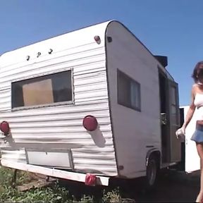 Three lesbo milfs fuck with a strap on and toys outside their trailers