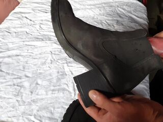 Cumming on her ankle boots