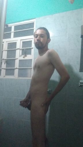 Handsome guy takes off his blue sweater and masturbates
