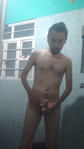 Handsome guy takes off his blue sweater and masturbates