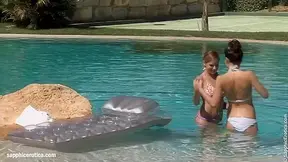 Billy and Jaquelin from Sapphic Erotica have lesbian sex in the pool