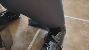 Crossdresser in black stockings and patent leather cheongsam