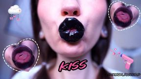 Goth girl kisses with phat black juicy lips