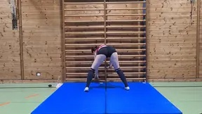 Gym nymph toys herself with a toy in the open gym