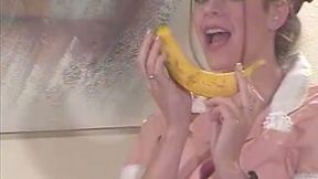 Horny waitress takes her uniform off and plays with a banana