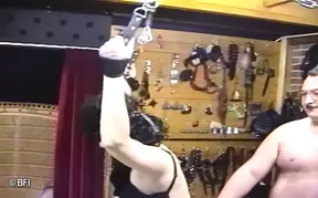 scened mature sub gets whipped and fisted in BDSM session