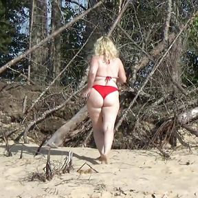 White-yellow-red and blue bikini in beach