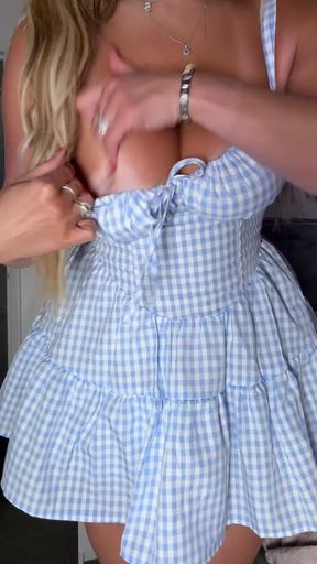 Curvy British MILF shows off big tits and hot tan lines