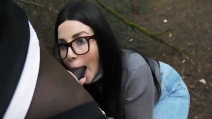 Slut sucks a black man in the woods