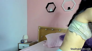 Small tits Colombian masturbates in bed on webcam