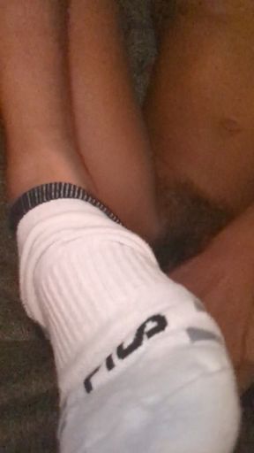 Amateur solo babe shows off her socks and tits in homemade video