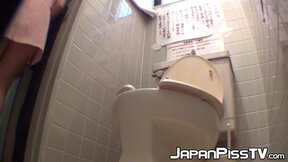 Japanese women piss in a bathroom with an up close camera